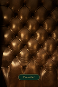 Tufted Chesterfield leather background with pre-order button — Spine & Cask tea pairing