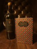 The Hound of the Baskervilles with Saint-Roch Aspicata wine and glass on leather